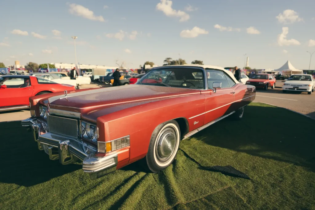 Classic cars at a Noosa motoring event with 2026 cancellation update
